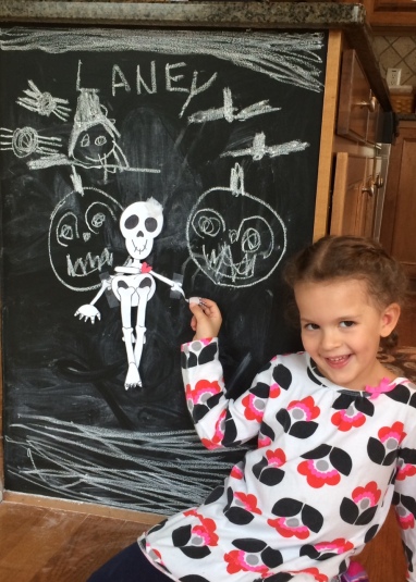 Laney and "Creepy" the dancing skeleton with a big heart! Great job!